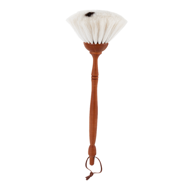 Handcrafted dust brush with soft natural goat hair bristles and smooth wooden handle, designed for gentle dusting of delicate surfaces, featured in Home & Decor and Household Cleaning collections.