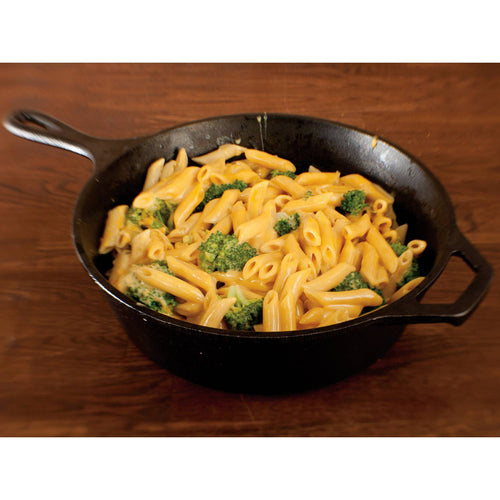 Black cast iron deep skillet filled with creamy macaroni and cheese with broccoli, suitable for Farm, Garden & Tool, Kitchen & Food, Camping, and Cookware collections.