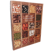 Book cover featuring an array of assorted vegetable seeds displayed in a wooden grid, highlighting seed saving and growing techniques, featured in Toys, Books & Games, Books, Home and Garden How-To Books, Best Sellers, and Promo Eligible collections.