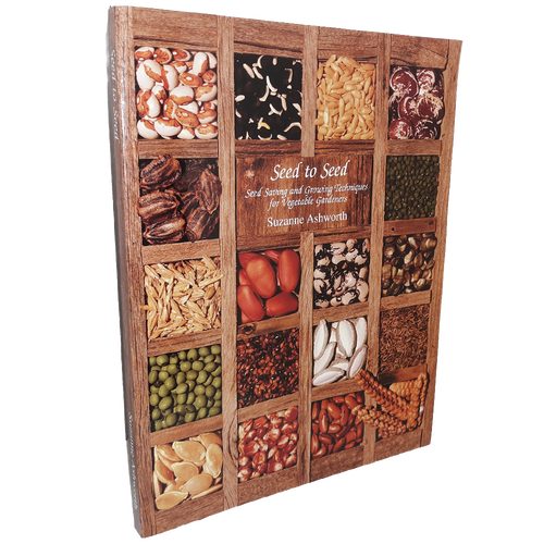 Book cover featuring an array of assorted vegetable seeds displayed in a wooden grid, highlighting seed saving and growing techniques, featured in Toys, Books & Games, Books, Home and Garden How-To Books, Best Sellers, and Promo Eligible collections.