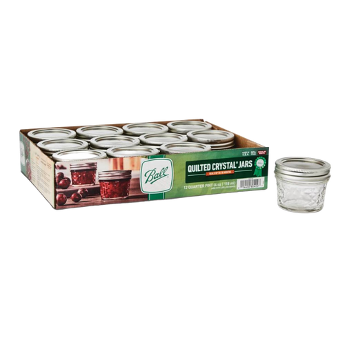 Set of twelve clear quilted glass jelly jars with silver lids in a branded box, designed for food preservation and canning, part of Kitchen & Food and USA Made collections.