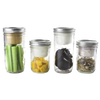 Four clear wide-mouth jars fitted with metal lids and white plastic divider cups, each holding different snacks like celery, diced mango, dark chocolate pieces, and granola, showcasing reusable kitchen gadgets for organized food storage and portioning, ideal for Kitchen & Food, Kitchen Accessories, Storage and Serving, USA Made, Best Sellers, and Promo Eligible collections.