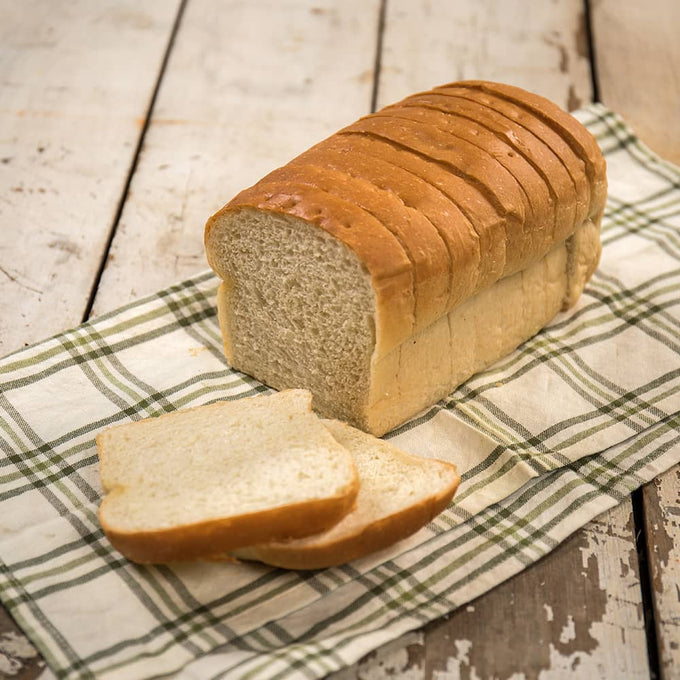 Soft sliced Amish-style bread with a golden crust, freshly baked in the USA, featured in Kitchen & Food, Snacks and Sweets, Best Sellers, and Promo Eligible collections.