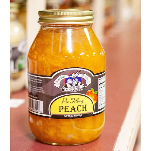 Handcrafted jar of Amish-made peach pie filling with natural fruit ingredients, free from corn syrup and artificial coloring, part of USA Made pantry and kitchen food collections.