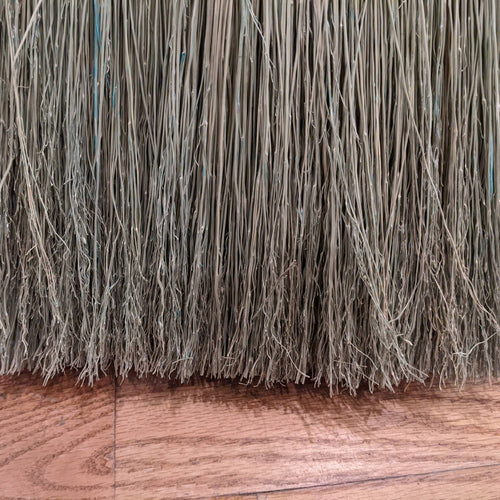 Close-up of handcrafted corn straw bristles with natural texture, part of an Amish made broom, ideal for home cleaning and featured in Household Cleaning and USA Made collections.