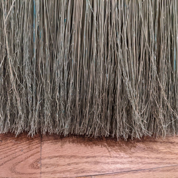 Close-up of handcrafted corn straw bristles with natural texture, part of an Amish made broom, ideal for home cleaning and featured in Household Cleaning and USA Made collections.