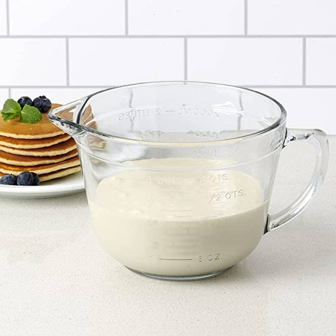 Clear, thick-walled glass batter bowl with sturdy handle and spout, embossed measurement markings, ideal for Kitchen & Food, Cookware, Baking Supplies, Storage and Serving, USA Made collections.