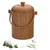 Handcrafted bamboo compost pail with removable lid featuring ventilation holes and a sturdy handle, designed for farm, garden, and composting use with odor control.