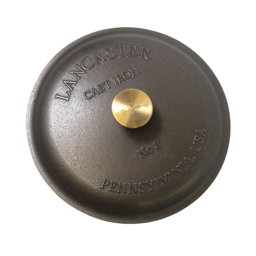 Handcrafted cast iron skillet lid with smooth finish and solid brass knob, embossed with Lancaster Pennsylvania USA and No 8, perfect for Kitchen & Food, Cast Iron, USA Made, and Best Sellers collections.