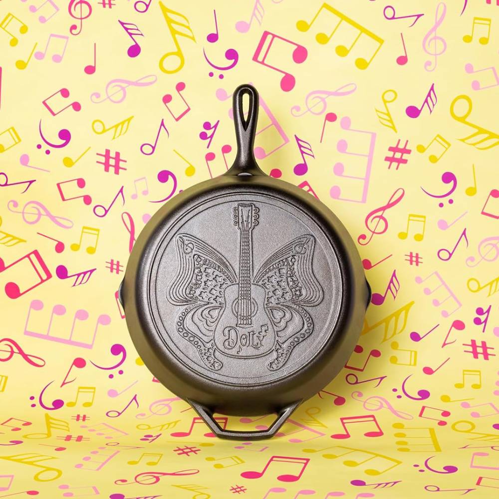 12-inch cast iron skillet featuring a butterfly and guitar design with "Dolly" lettering, handcrafted in USA, ideal for Kitchen & Food, Cookware, Cast Iron, USA Made, Best Sellers, and Promo Eligible collections.