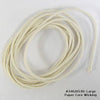 Coiled natural fiber wick with a paper core, designed for use in container candles over 4 inches, suitable for handmade candle crafting within lamps and lighting collections.