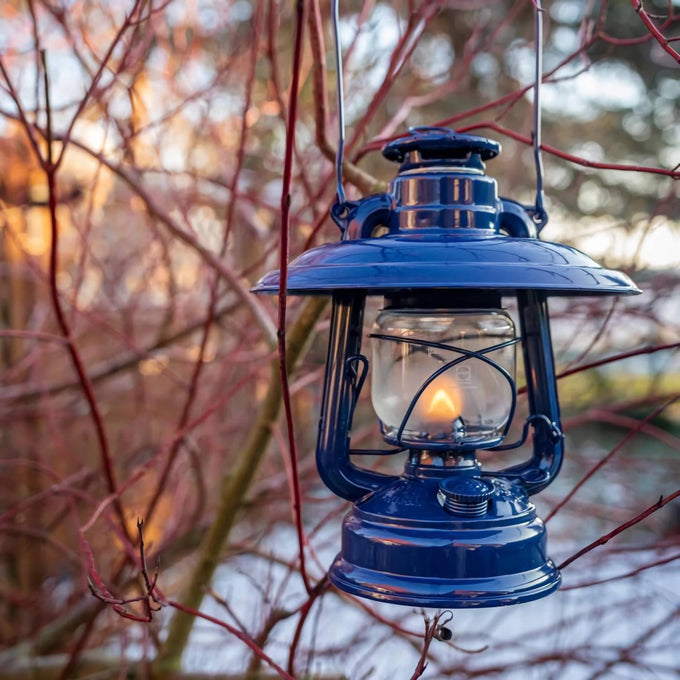 Unique handcrafted deep blue steel reflector shade directing light downward to reduce glare and protect the glass globe, featured in Lamps & Lighting, Emergency Supplies, Oil Lamps, Best Sellers, and Promo Eligible collections.