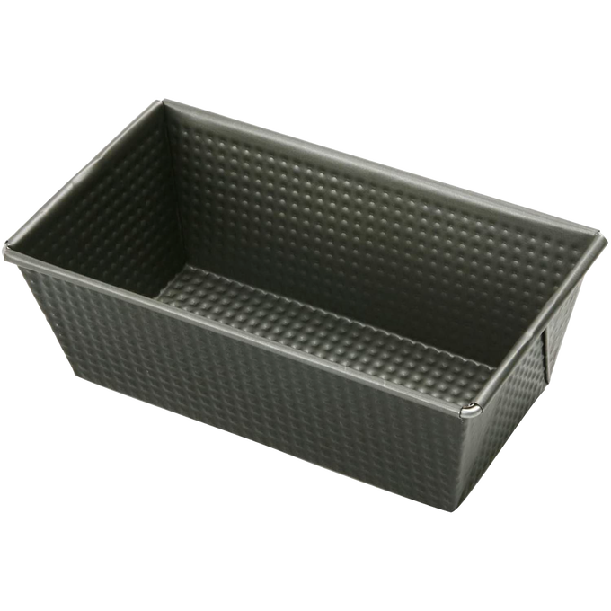 Non-stick heavy gauge steel loaf pan with corrugated sides and tapered square corners, designed for bread making and baking, featured in Kitchen & Food and Baking Supplies collections.