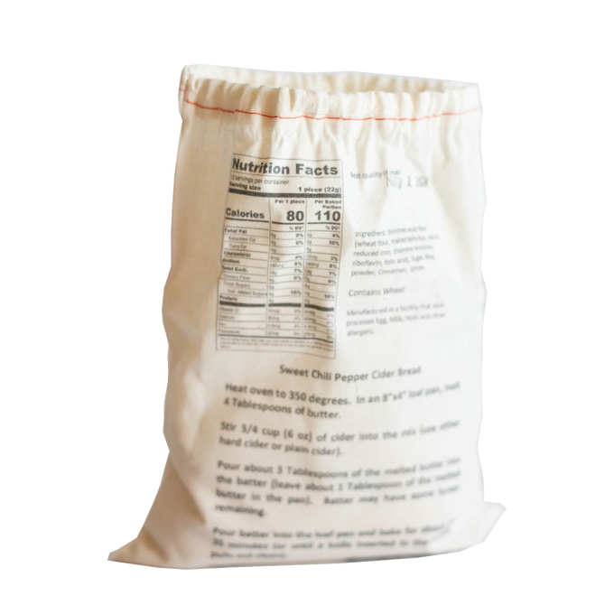 Natural cotton drawstring bag featuring handcrafted Sweet Chili Pepper Cider Bread mix with baking instructions and nutrition facts, ideal for Kitchen & Food, Pantry, Dry Goods and Mixes, Best Sellers, and Promo Eligible collections.