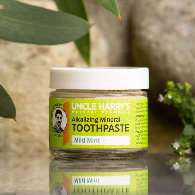 Handcrafted small glass jar of mild mint alkalizing mineral toothpaste with white lid and bright green label, promoting Health & Wellness, Grooming and Personal Hygiene, USA Made, Best Sellers, and Promo Eligible collections.