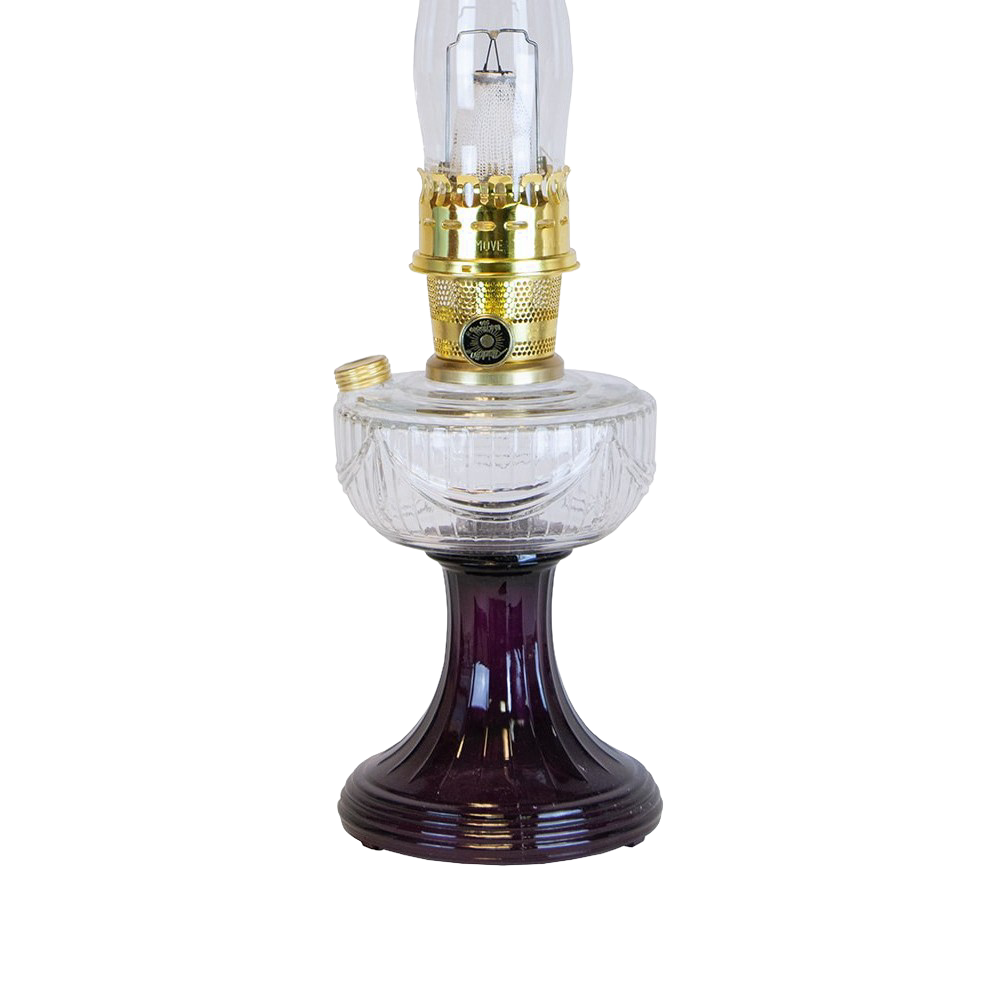 Handcrafted oil lamp featuring a clear glass font over a rich amethyst glass pedestal base with polished brass burner, ideal for Lamps & Lighting, Oil Lamps, Table Lamps, and Best Sellers collections.