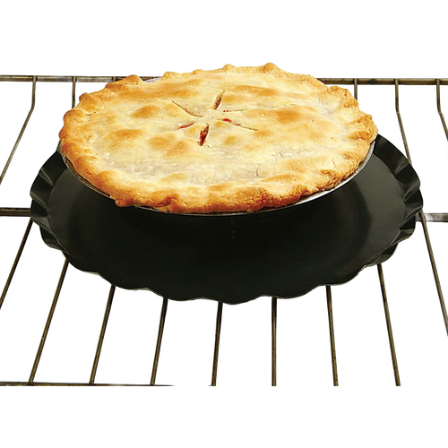 Black oven splatter guard with raised center lip and central hole for heat flow, placed on an oven rack beneath a golden-baked pie, suitable for Kitchen & Food and Kitchen Gadgets collections.