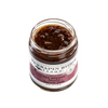 Open jar of handcrafted hot pepper bacon jam with visible textured blend, made in USA and featured in Kitchen & Food, Pantry, and Best Sellers collections.