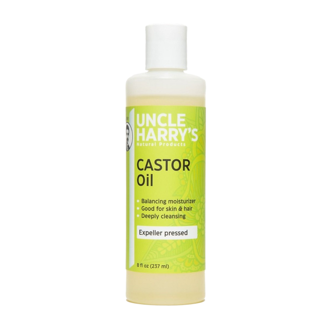 Bottle of Uncle Harry's castor oil moisturizer with expeller pressed formula, designed for skin and hair care, part of Health & Wellness, Grooming, and USA Made collections.