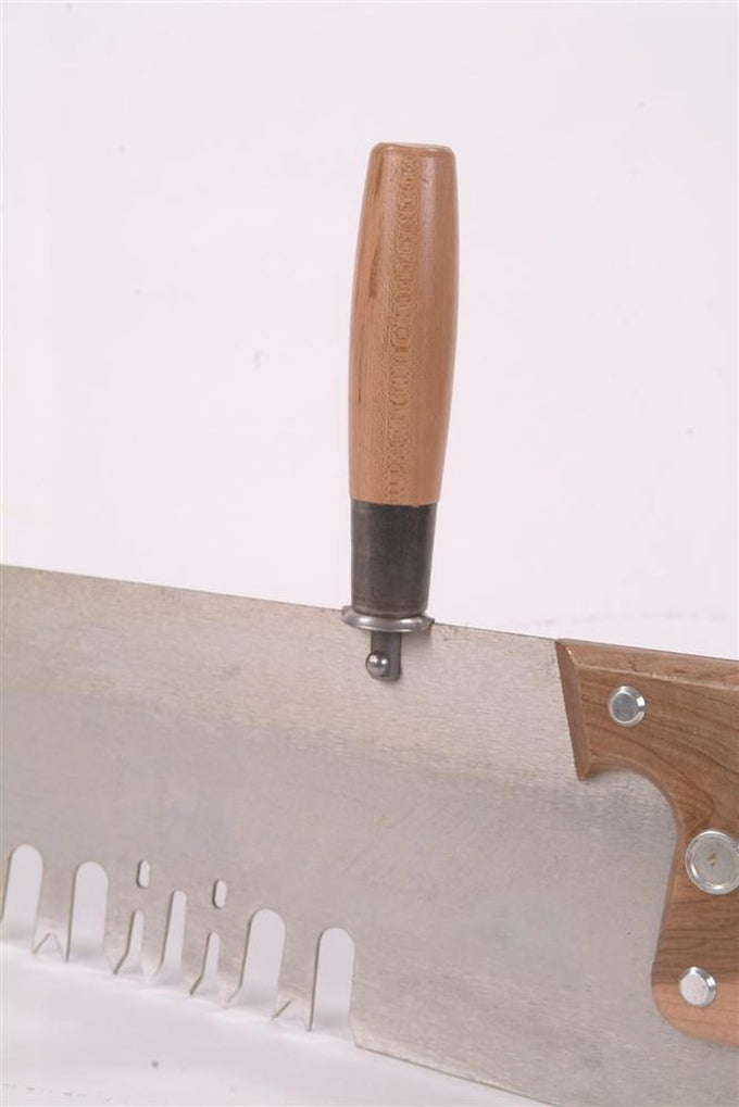 Close-up of a handcrafted wooden saw handle attached to a metal crosscut saw blade, designed for better control in woodworking and featured in Farm, Garden & Tool, Hand Tools and Hardware, and USA Made collections.