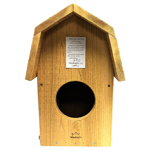 Handcrafted barn owl shelter made of unfinished kiln-dried cedar with a pitched roof and circular entrance, designed for outdoor use in Farm, Garden & Tool and Garden Accessories collections.