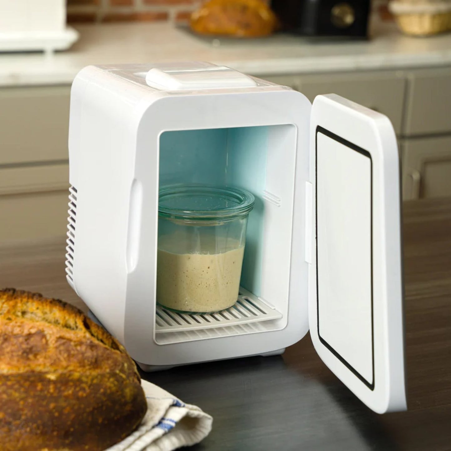 Compact white fermentation chamber with clear glass jar inside, designed to maintain ideal temperature for sourdough starters, featured in Kitchen & Food and Baking Supplies collections.
