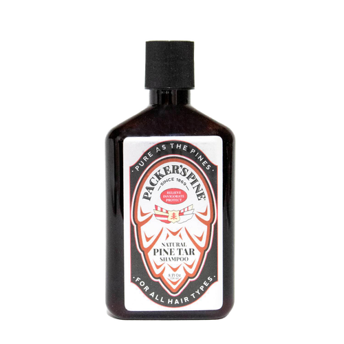 Dark amber bottle of handcrafted natural pine tar shampoo with white label featuring traditional design, highlighting scalp relief and invigoration, part of USA Made health collections.