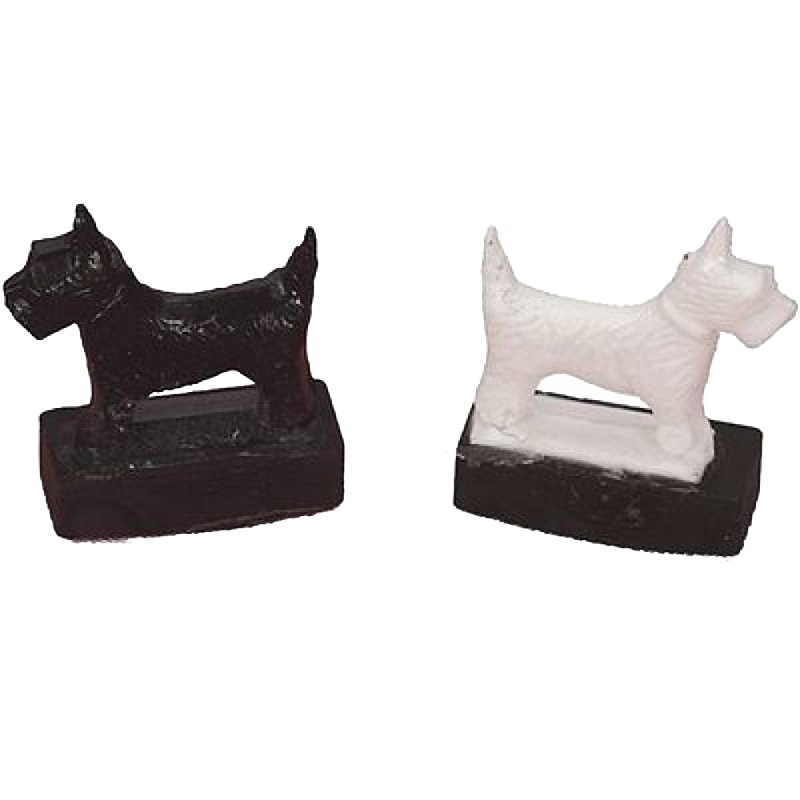Handcrafted magnetic Scottie dog toys in black and white with a sturdy base, designed for indoor play and children's entertainment, made in the USA and featured in best sellers.