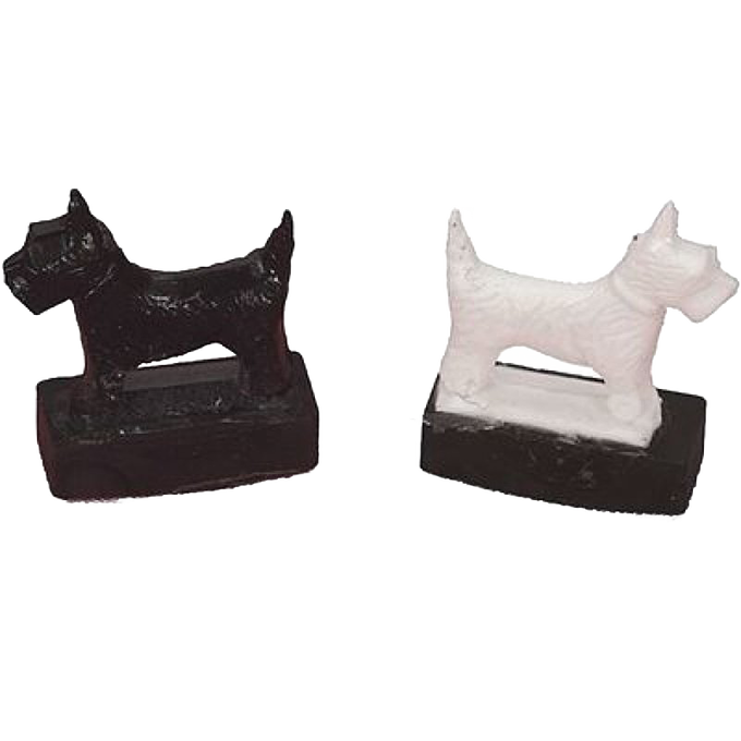 Handcrafted magnetic Scottie dog toys in black and white with a sturdy base, designed for indoor play and children's entertainment, made in the USA and featured in best sellers.