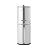 Tall stainless steel water filter with two chambers and spigot, designed for high-capacity water purification, featured in Appliances, Emergency Supplies, and Berkey Water Filters collections.