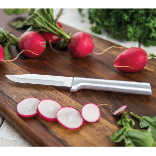 Rada paring knife with a sharp carbon stainless steel blade and durable cast aluminum handle featuring a non-slip satin finish, resting on a wooden board with sliced radishes, ideal for kitchen food prep in USA made and best sellers collections.