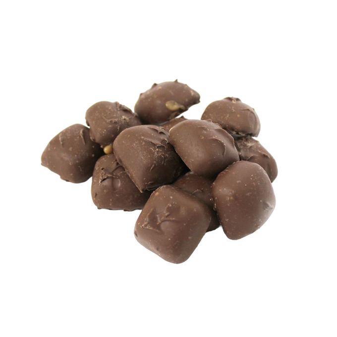 Pile of sugar-free chocolate-covered vanilla caramel candies with smooth coating, handcrafted in the USA, featured in Kitchen & Food, Snacks and Sweets, and Candy collections.