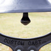 Close-up of the striker inside a black painted cast aluminum farm bell, handcrafted and Amish made, perfect for Home & Decor, Farm, Garden & Tool, and Amish Made collections.