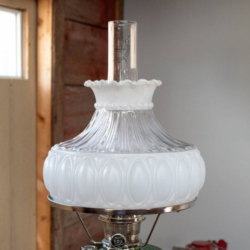 Clear glass oil lamp chimney paired with a frosted glass shade featuring an embossed oval pattern and ruffled top, designed for durable use in Lamps & Lighting and Parts and Accessories collections.