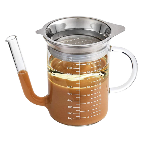 Clear borosilicate glass strainer and measuring pitcher with wide spout and stainless steel mesh top, perfect for Kitchen & Food, Food Prep, and Measuring collections.
