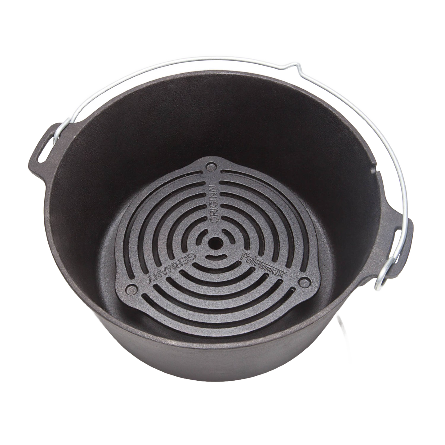 Solid cast iron grate with raised legs positioned inside a Dutch oven, designed for superior heat management during multi-level baking and roasting, ideal for camping and kitchen collections.