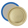 Close-up of two wide-mouth canning jar lids with one gold-colored lid embossed with "superb" and one inner sealing lid featuring a blue ring, highlighting durable design for food preservation and canning collections.