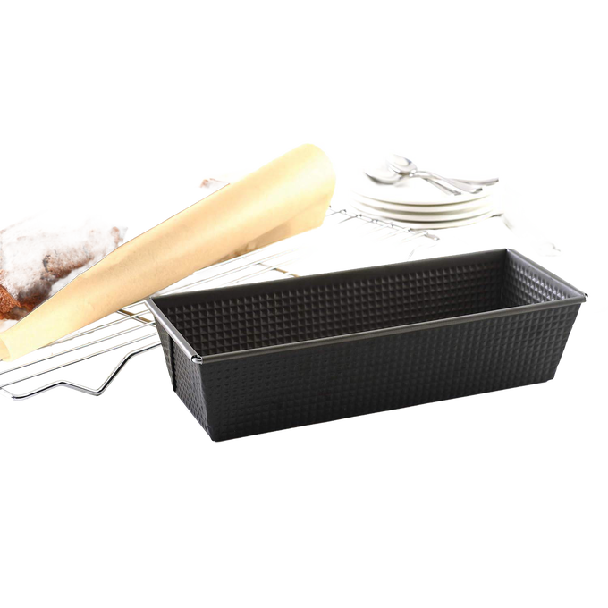 Durable heavy gauge steel loaf pan with textured nonstick surface and tapered sides, designed for versatile baking in Kitchen & Food, Cookware, and Baking Supplies collections.