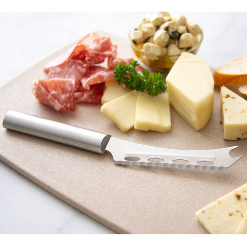 Serrated cheese knife with stainless steel handle cutting soft and hard cheese on a serving board with sliced salami, marinated mushrooms, and bread, part of Kitchen & Food and USA Made collections.