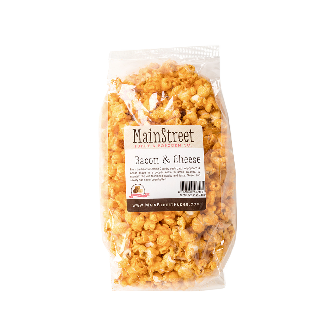 Clear plastic bag filled with handcrafted bacon and cheese flavored popcorn made in USA, perfect for Kitchen & Food, Food, Popcorn, and Best Sellers collections.