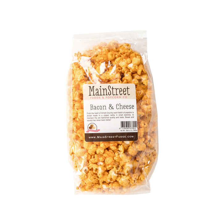 Clear plastic bag filled with handcrafted bacon and cheese flavored popcorn made in USA, perfect for Kitchen & Food, Food, Popcorn, and Best Sellers collections.