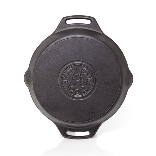 Top view of a sturdy cast iron fire skillet with two side handles and embossed center emblem, ideal for farm, garden, kitchen, camping, cookware, and cast iron collections.