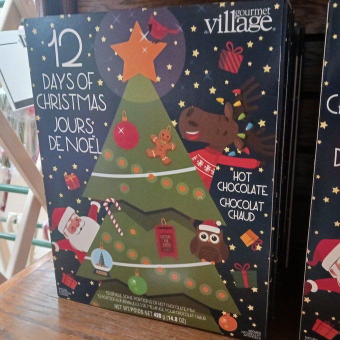 Festive 12 Days of Hot Chocolate Advent Calendar featuring 12 single-serve holiday flavors with handcrafted designs, perfect for Kitchen & Food, Snacks and Sweets, Beverages, Best Sellers, and Promo Eligible collections.