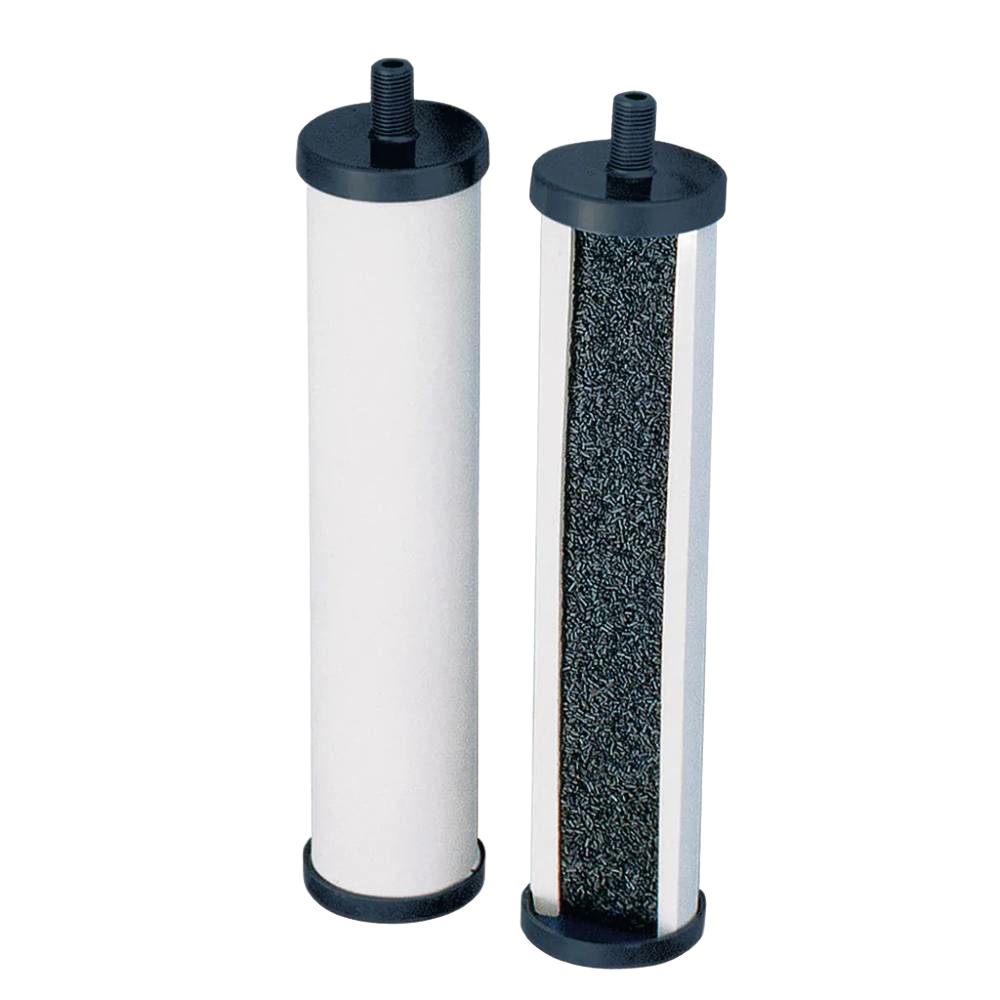 Two cylindrical replacement elements for tabletop water filtration featuring black end caps with one showing granular filter material, part of emergency and water treatment appliances.