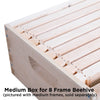 Close-up of a handcrafted Amish-made wooden 8-frame medium bee box with assembled medium frames, featuring smooth natural wood, ideal for beekeeping and farm tool collections in the USA.