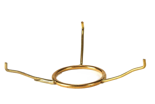 Handcrafted brass tripod holder with three bent arms and a circular center ring, designed for supporting lamp shades, featured in Lamps & Lighting, Parts and Accessories, Shade Rings and Holders, Best Sellers, Promo Eligible collections.