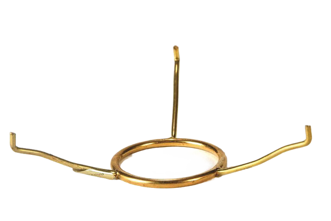 Handcrafted brass tripod holder with three bent arms and a circular center ring, designed for supporting lamp shades, featured in Lamps & Lighting, Parts and Accessories, Shade Rings and Holders, Best Sellers, Promo Eligible collections.