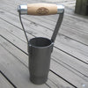 Handcrafted British style bulb planter with a sharp cutting edge and sustainably made ash wood handle, designed for easy soil extraction in farm and garden use.