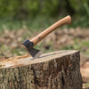 Handcrafted mini hatchet with a smooth hickory handle and polished steel head embedded in a tree stump, ideal for wood cutting in Farm, Garden & Tool and Axes collections.