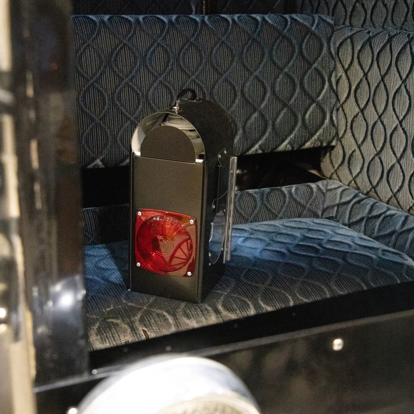 Handcrafted Amish buggy carriage lantern box featuring a red reflector lens and metal construction, designed for safe travel and ideal for camping, emergency supplies, and outdoor use.
